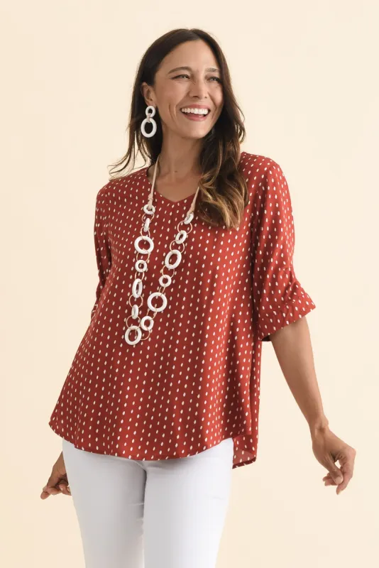 Riveria Rust Dash V Neck Top sold by Blue Bungalow