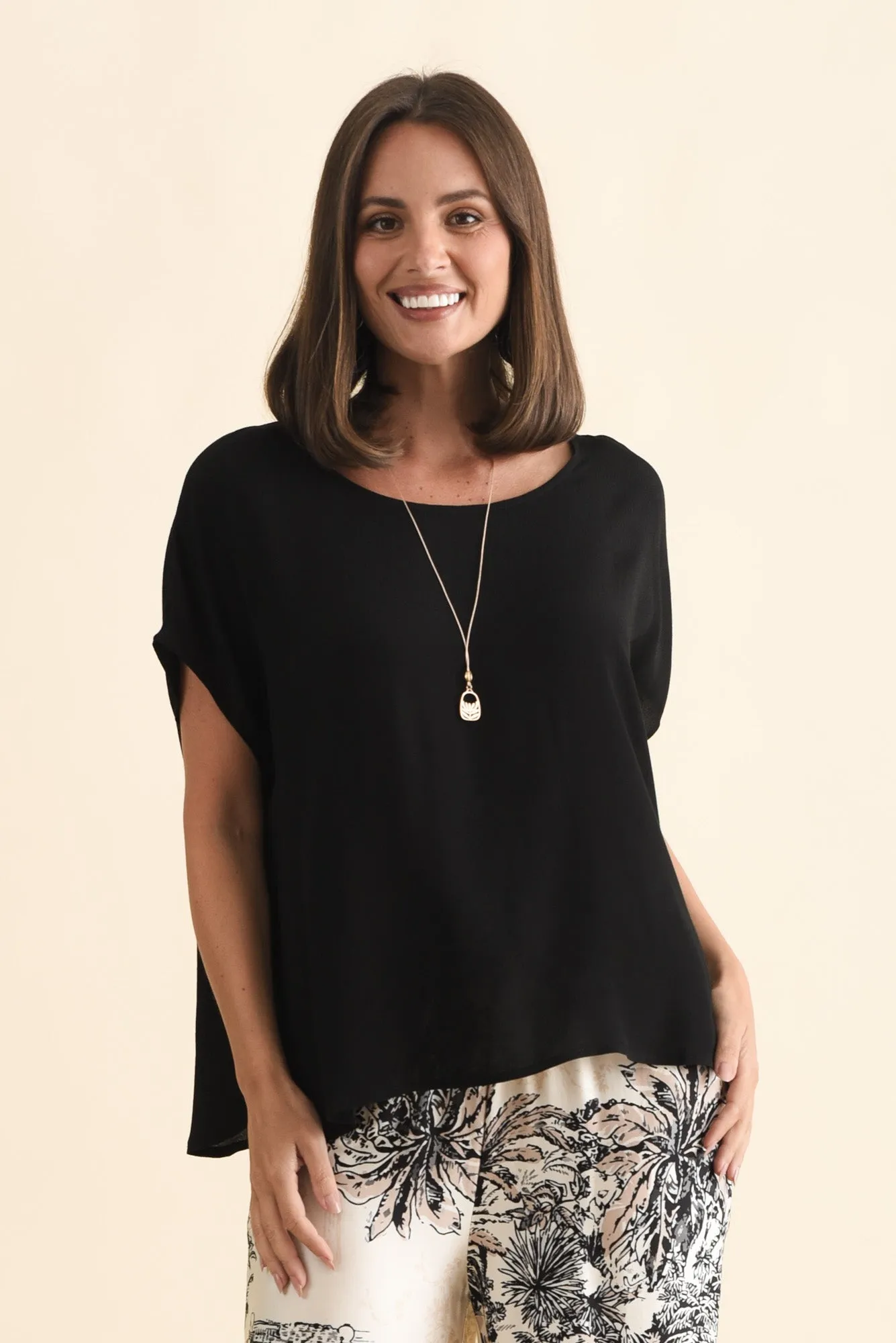 Sali Black Drape Top sold by Blue Bungalow