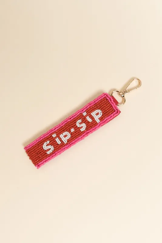 Red Sip Sip Beaded Keychain sold by Blue Bungalow