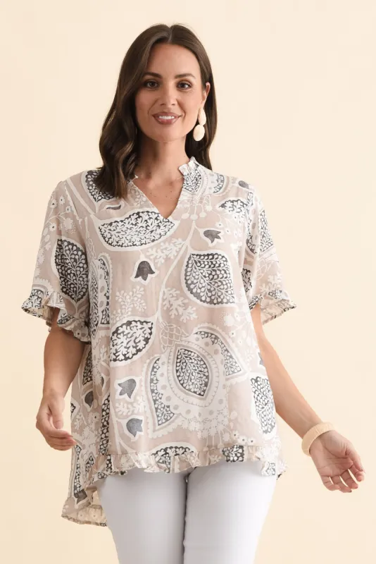 Calm Beige Flower Ruffle Top sold by Blue Bungalow