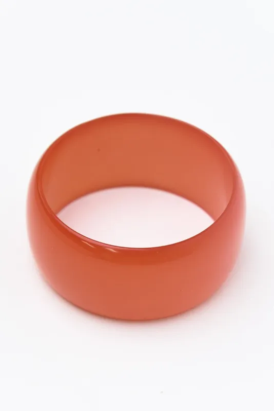 Medea Orange Bangle sold by Blue Bungalow