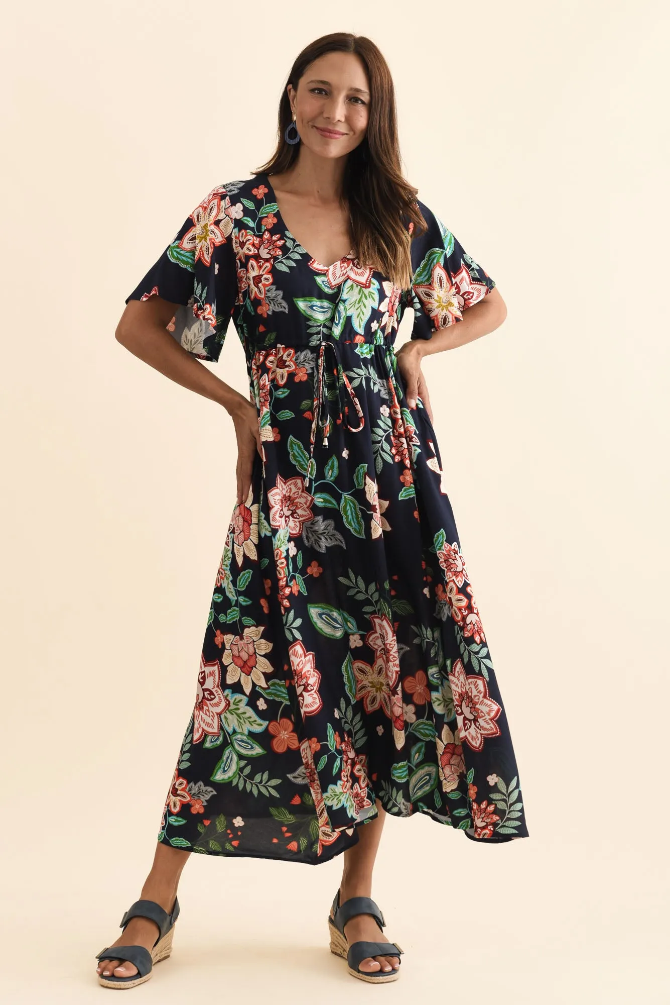 Jennifer Navy Floral Flutter Sleeve Dress sold by Blue Bungalow