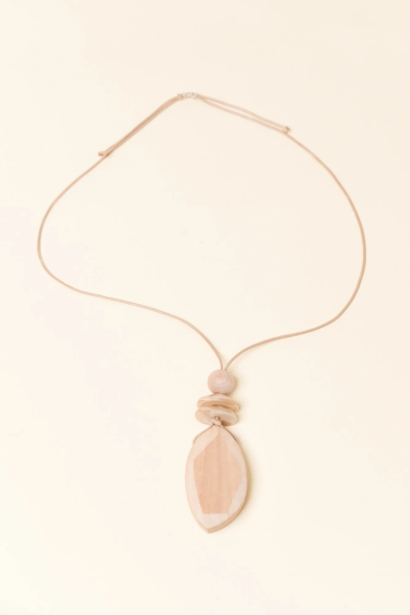Eleri Natural Wood Pendant Necklace sold by Blue Bungalow