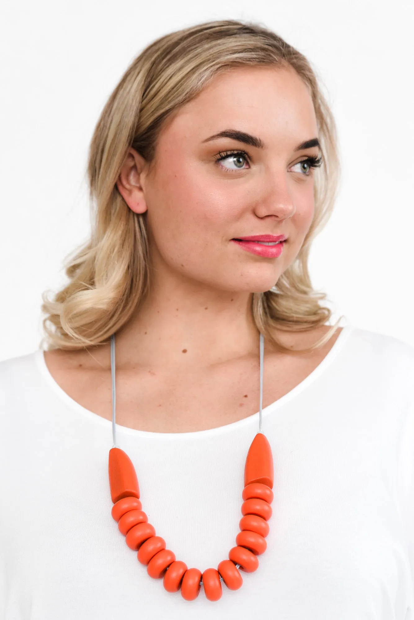 Vyla Orange Wooden Bead Necklace sold by Blue Bungalow