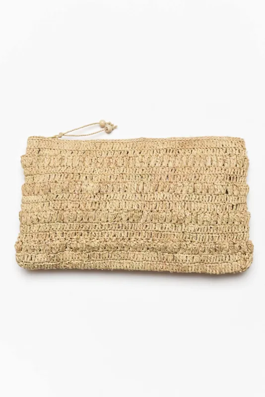 Eloise Natural Raffia Clutch sold by Blue Bungalow