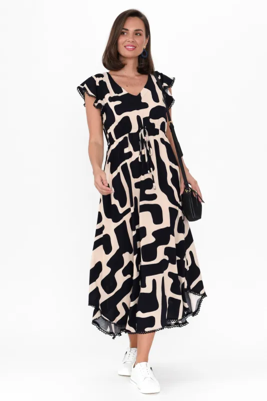 Libby Dark Navy Geo Midi Dress sold by Blue Bungalow