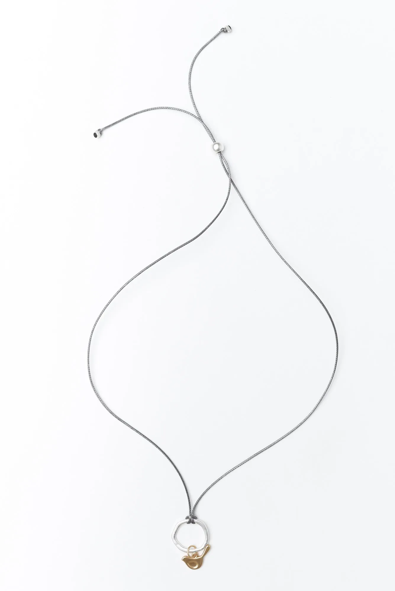 Sofia Silver Bird Cord Necklace sold by Blue Bungalow