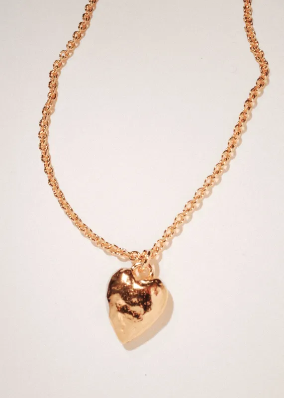 Heart Burn Pendant in Gold made by Mondo Mondo