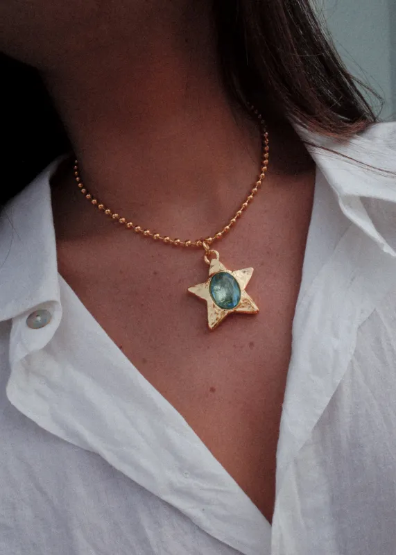 Star Pacha Necklace in Gold - Aqua made by Mondo Mondo