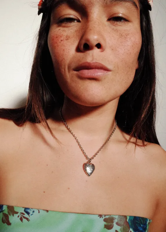 Archive Heart Burn Pendant in Silver made by Mondo Mondo