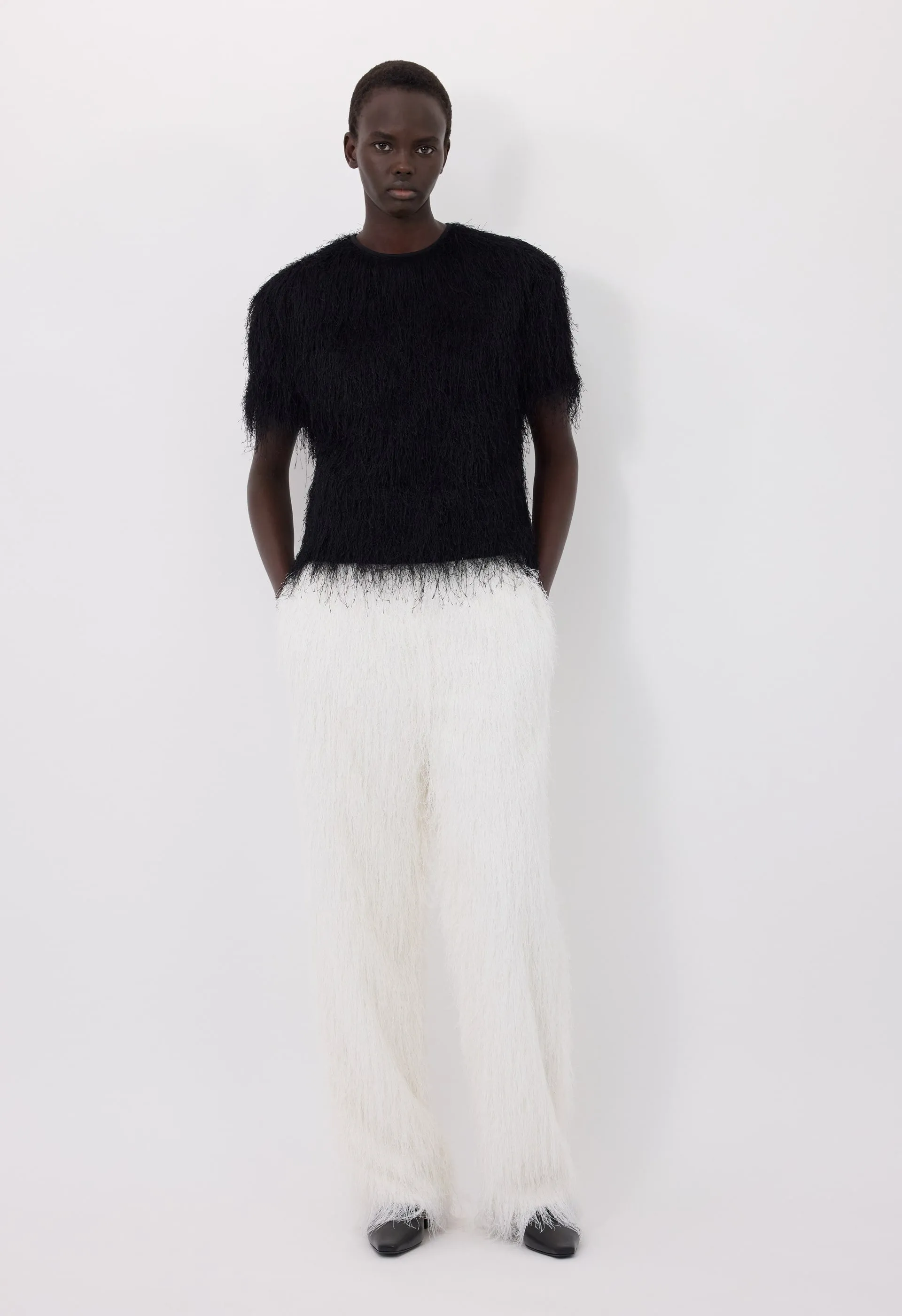ZARO Fringed fabric top sold by Loulou De Saison
