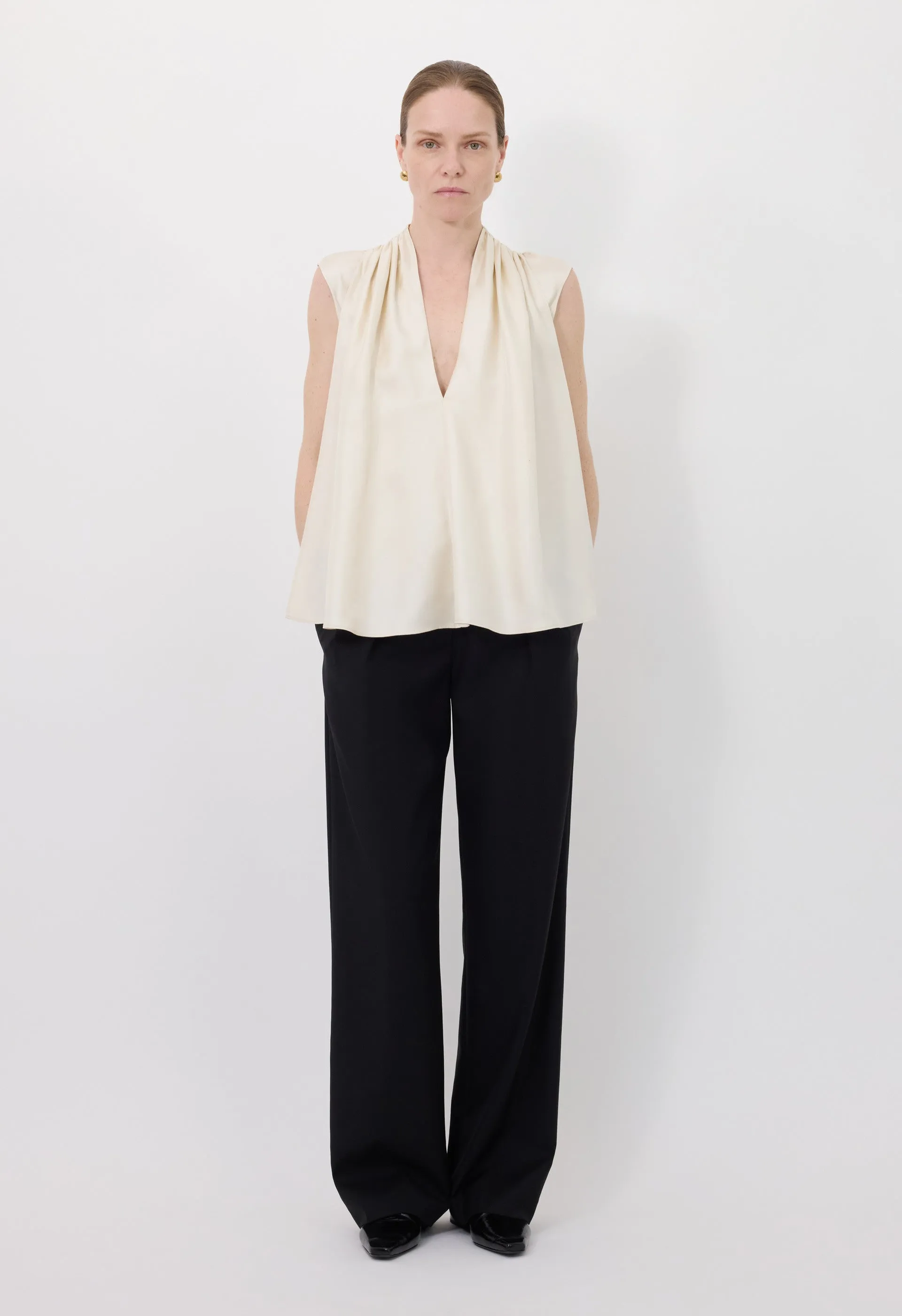 SADE Sleeveless silk top sold by Loulou De Saison