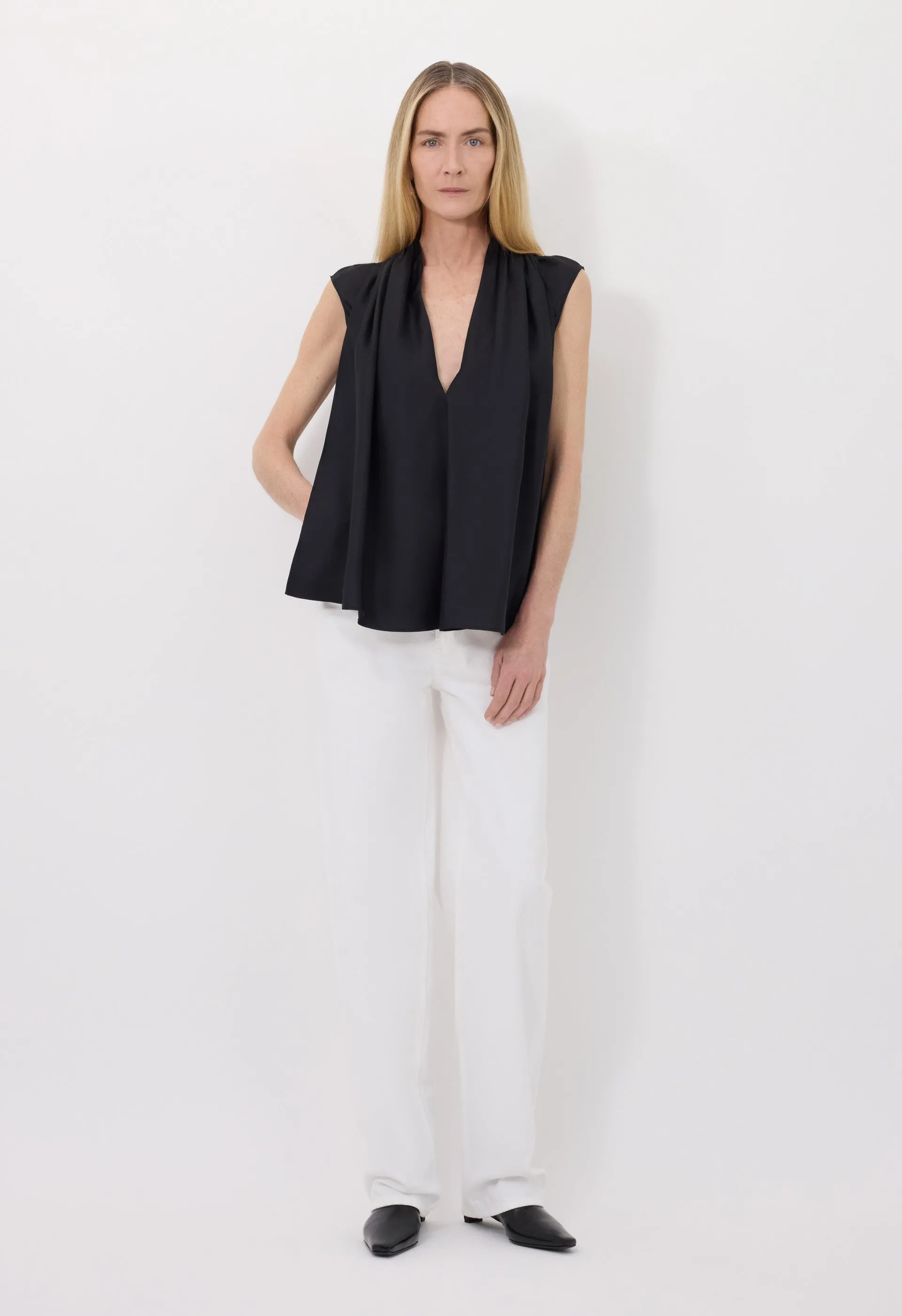 SADE Sleeveless silk top sold by Loulou De Saison