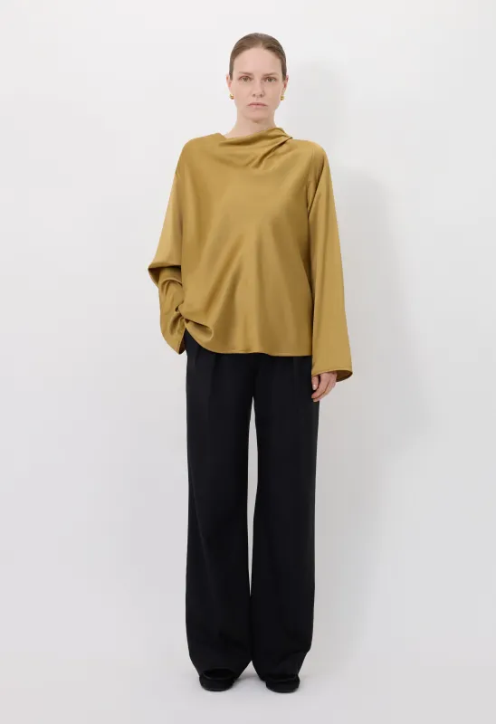 RIDDY Draped satin blouse sold by Loulou De Saison