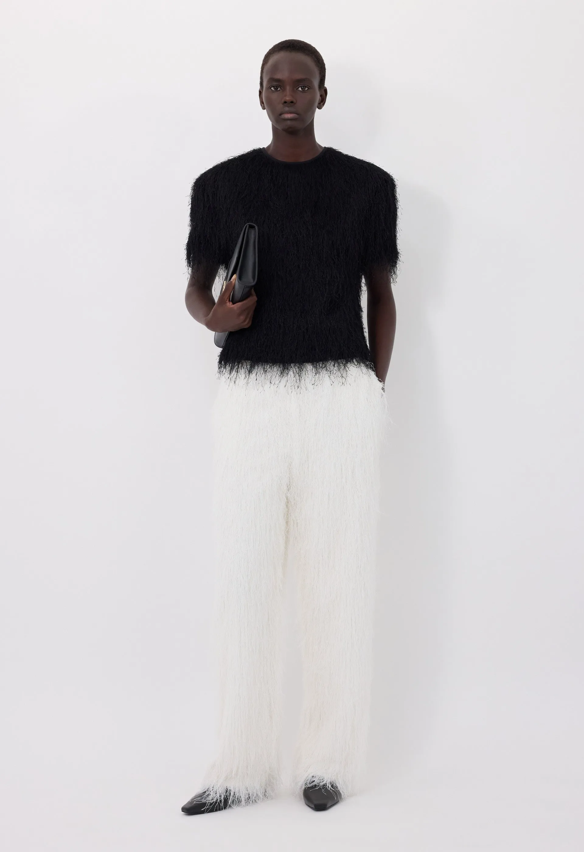REED Fringed trousers sold by Loulou De Saison