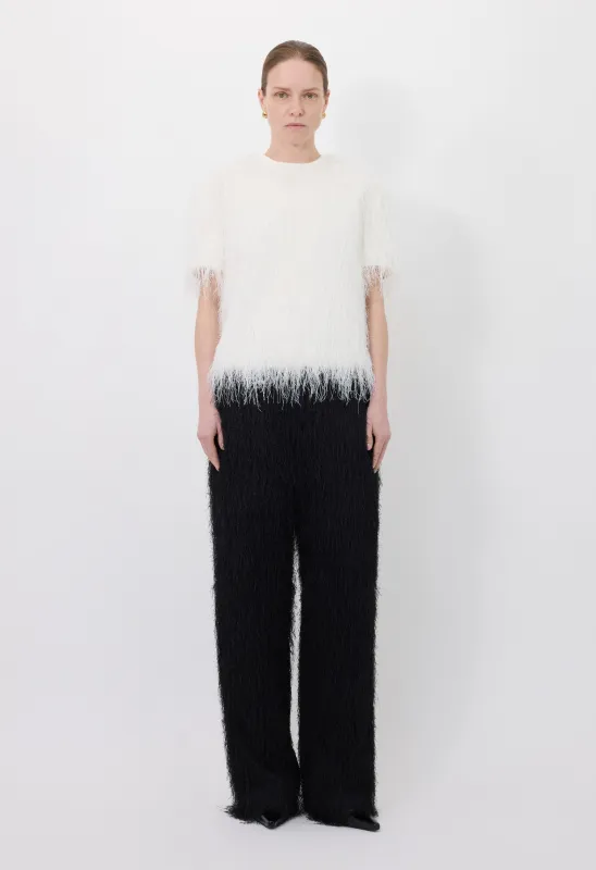 REED Fringed trousers made by Loulou De Saison