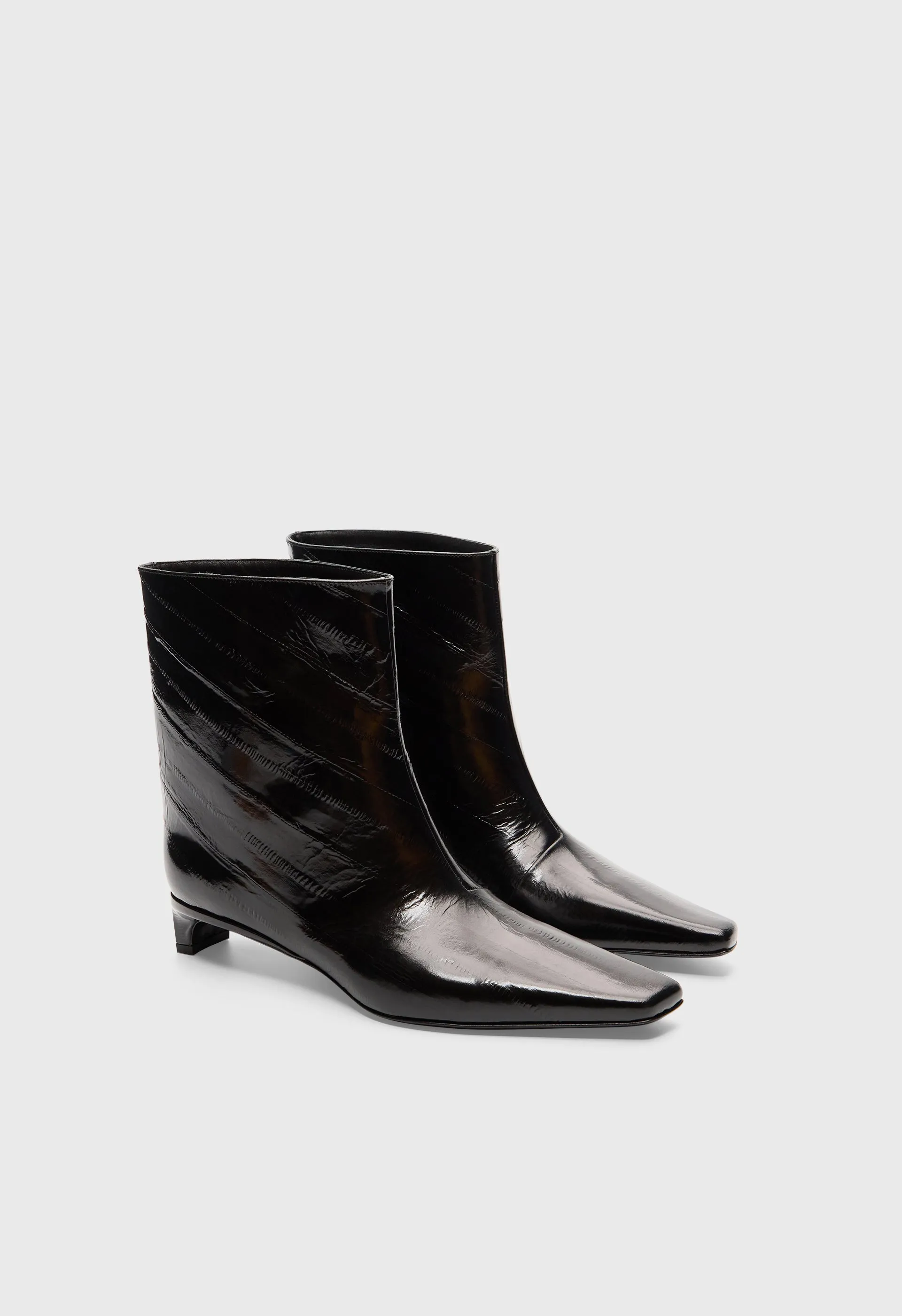 IMAN Eel-effect leather ankle boots sold by Loulou De Saison