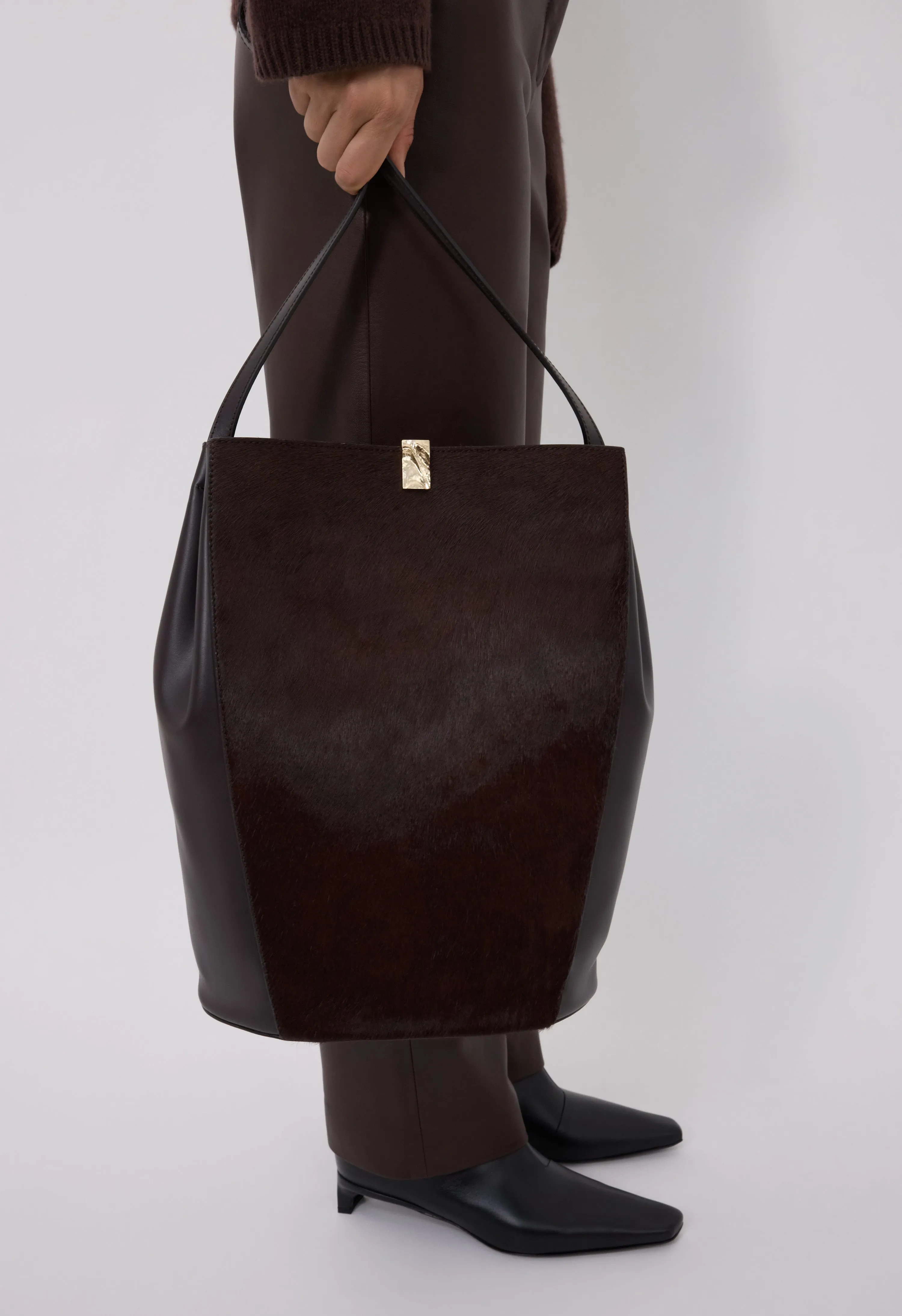 ODILE Pony-effect leather bucket bag sold by Loulou De Saison