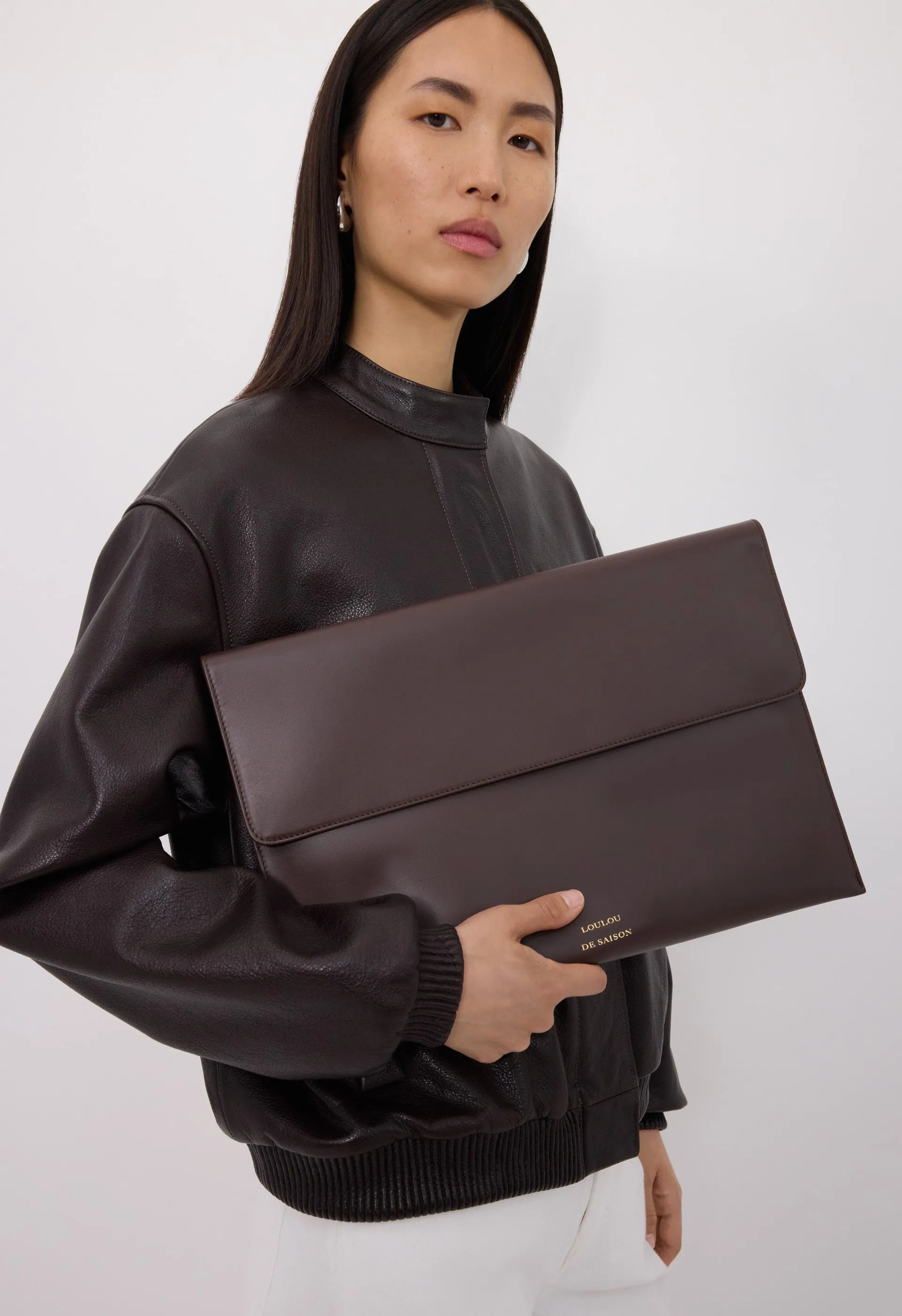 GAIA Leather clutch sold by Loulou De Saison