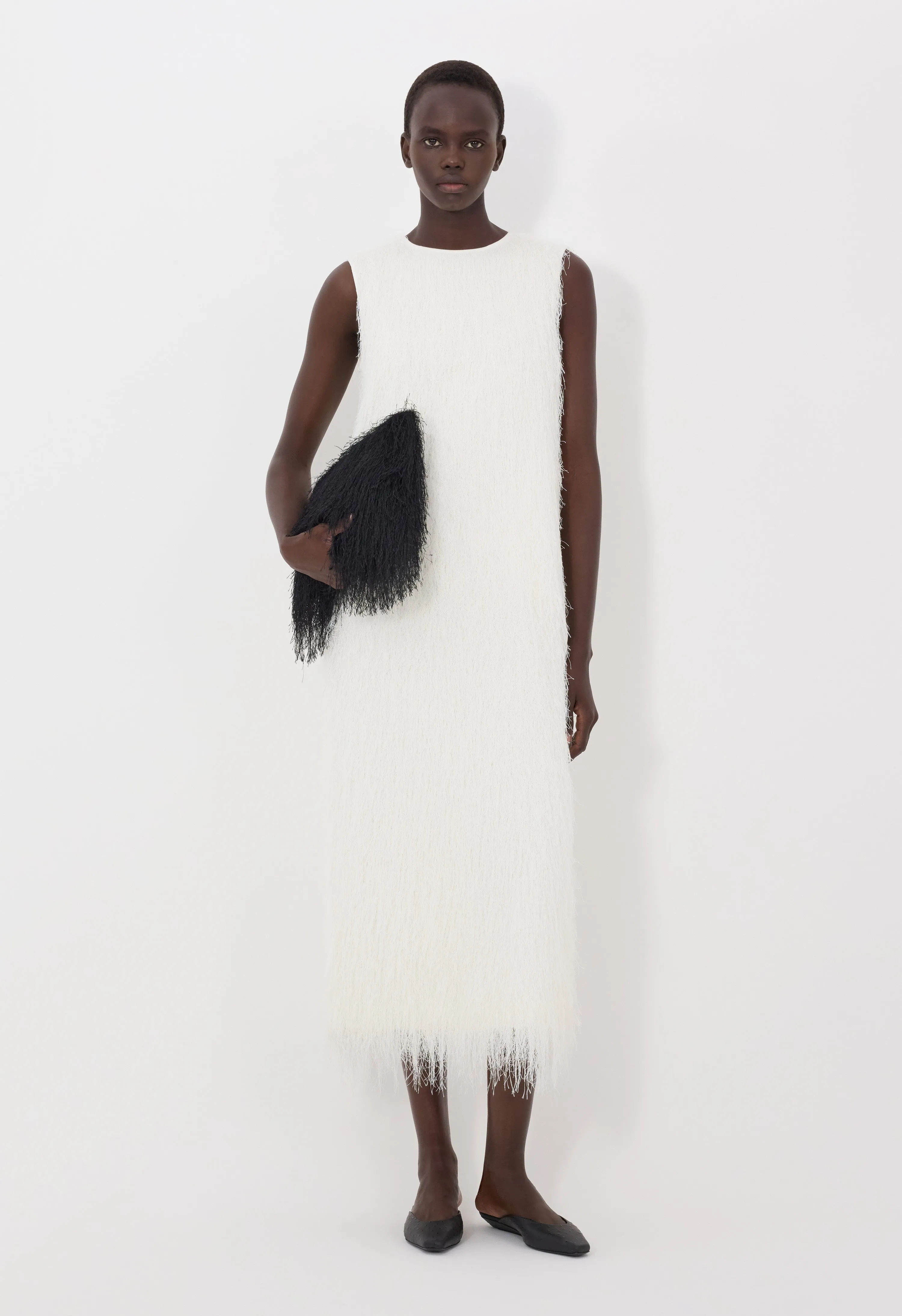TIWA Maxi fringed dress sold by Loulou De Saison