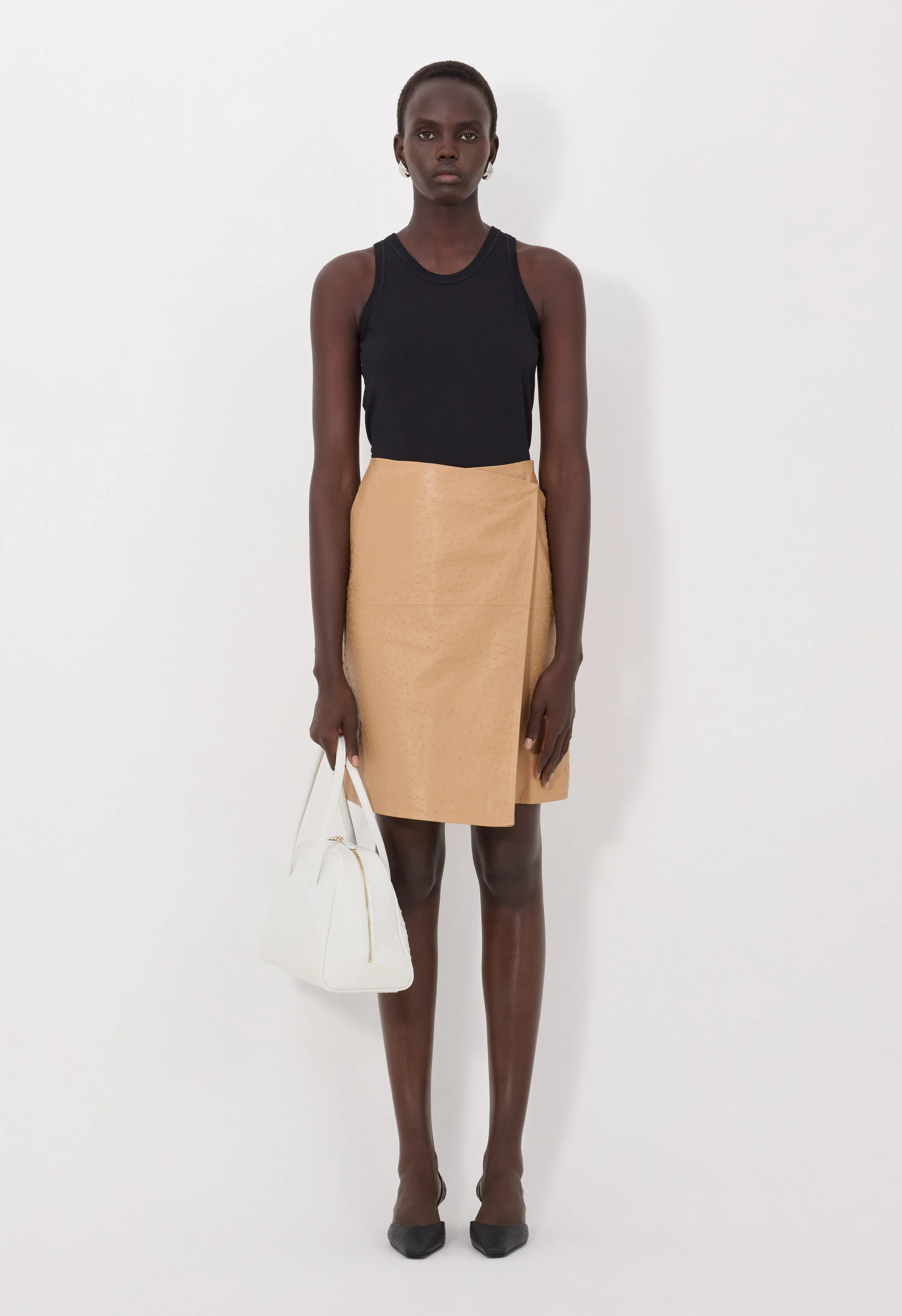 GORA Ostrich-effect leather wrap skirt sold by Loulou De Saison