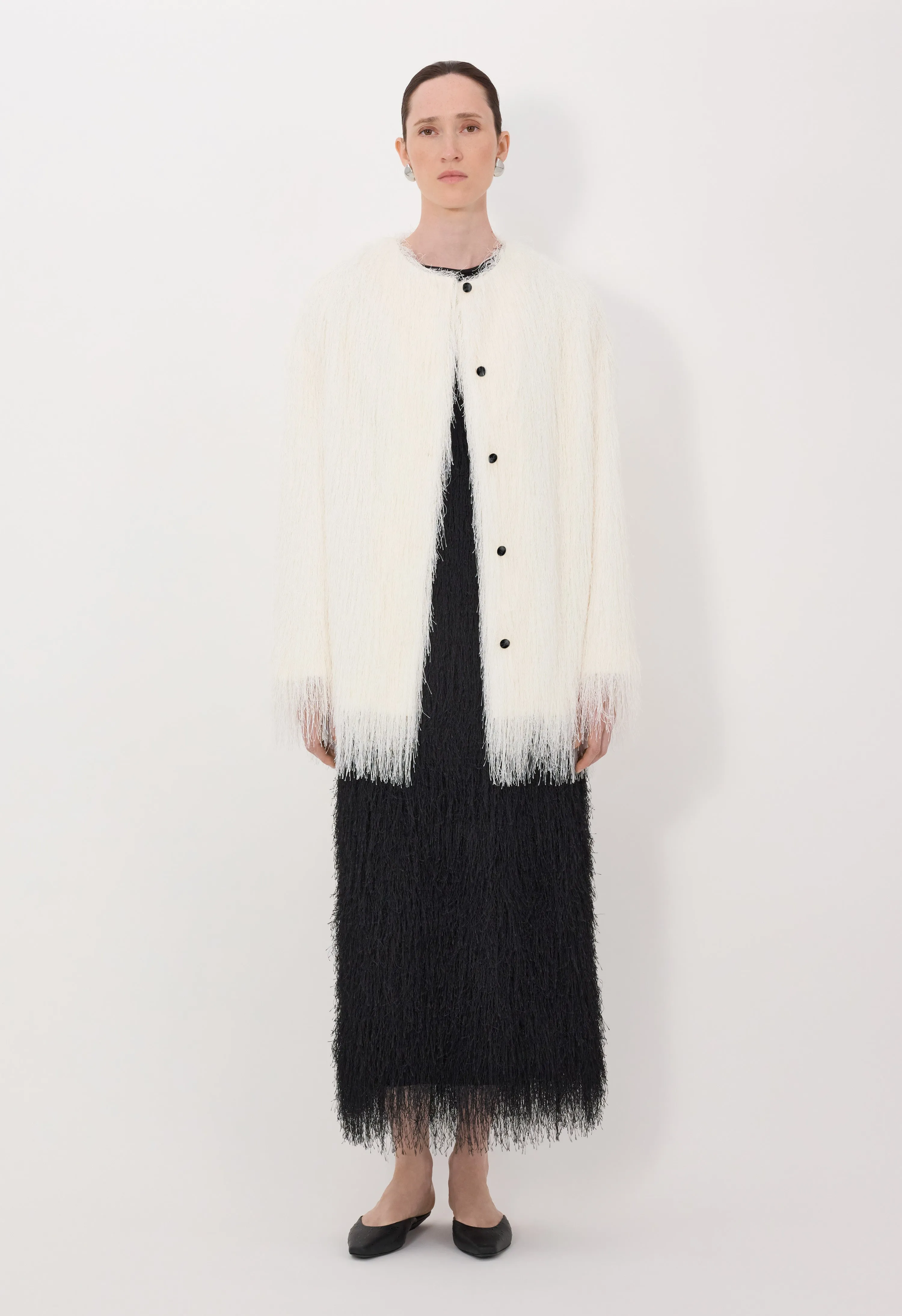 FILIPO Fringed coat sold by Loulou De Saison
