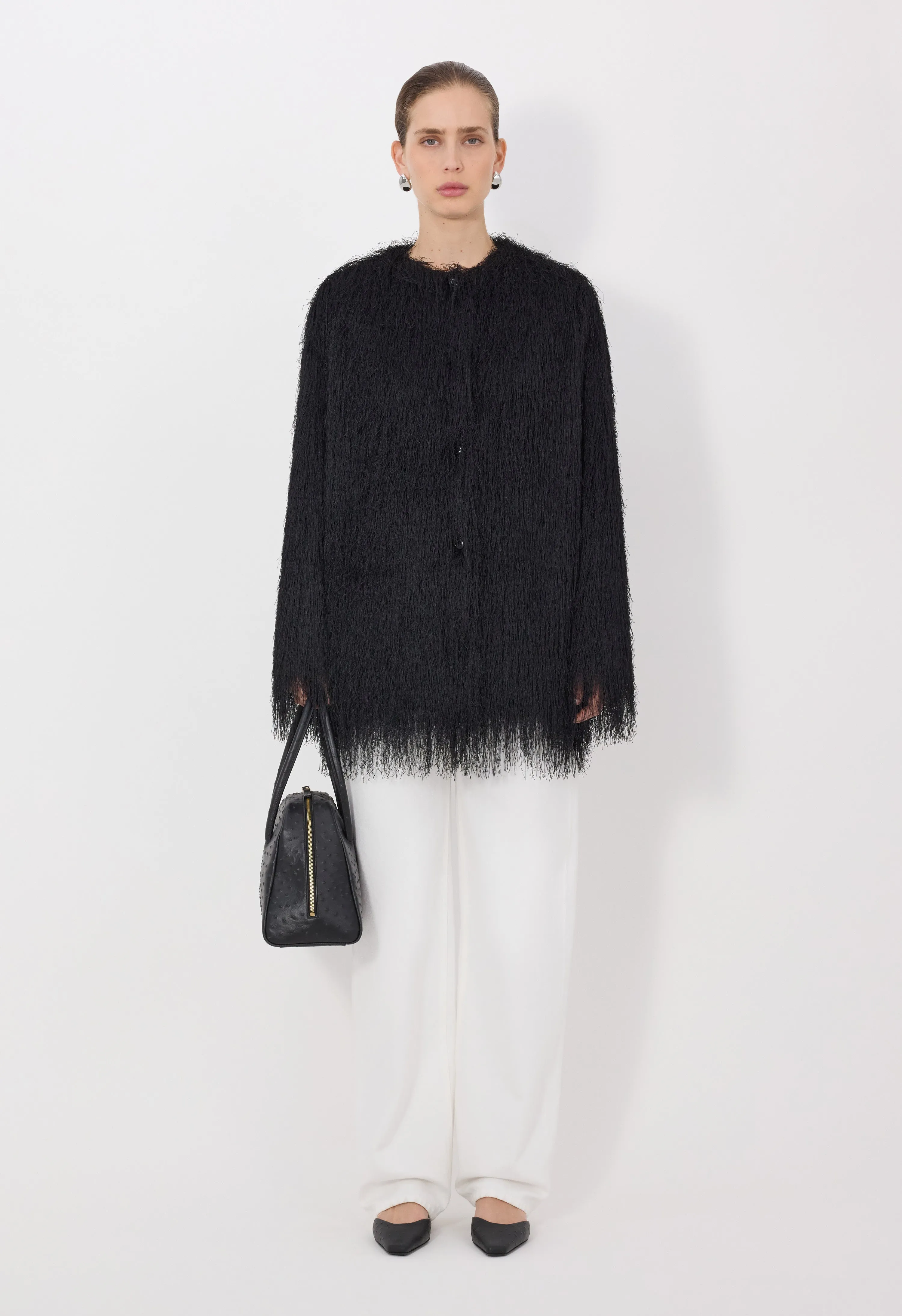 FILIPO Fringed coat sold by Loulou De Saison
