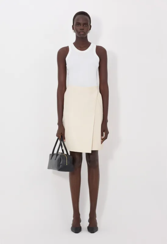 GORA Ostrich-effect leather wrap skirt made by Loulou De Saison