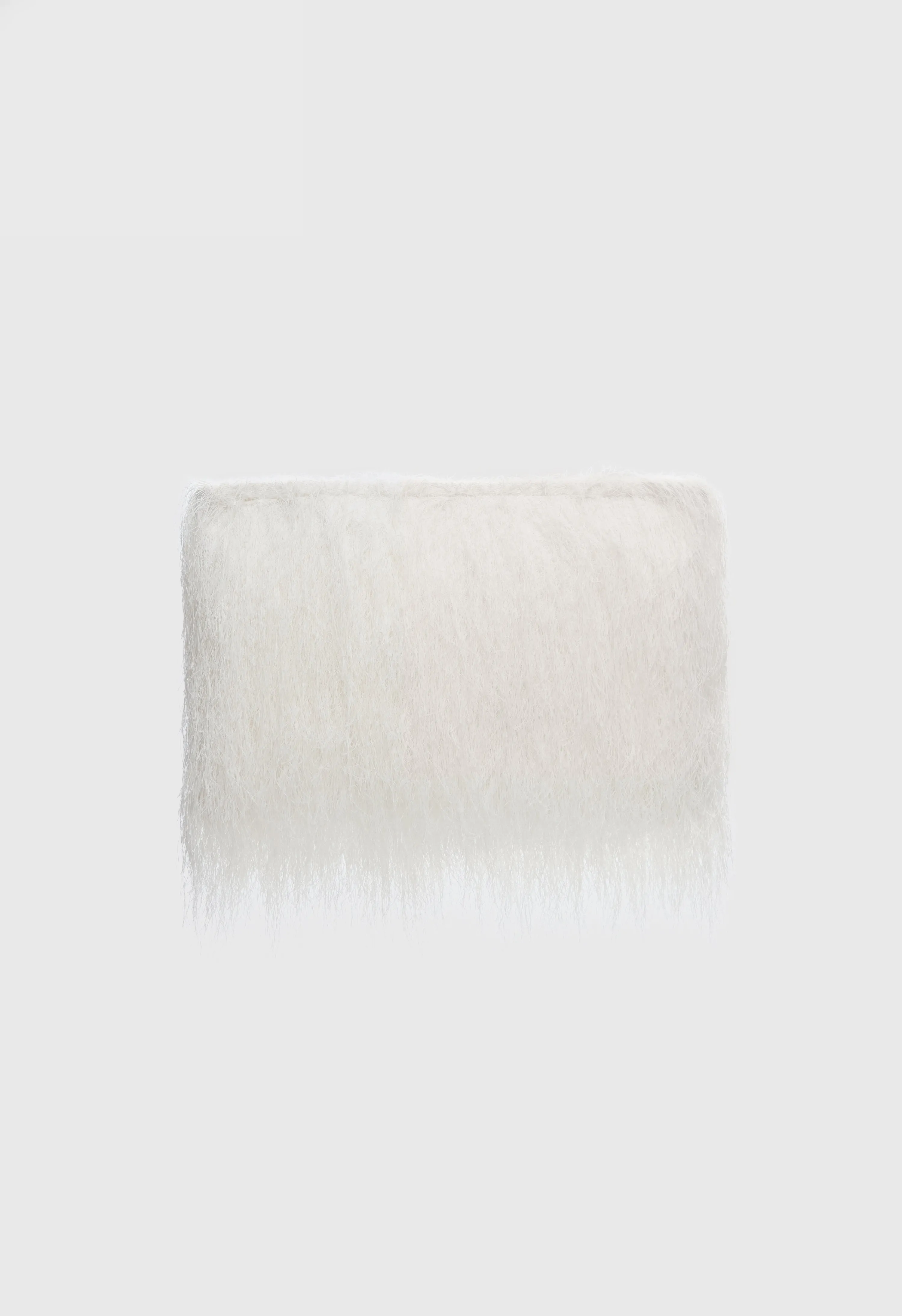 EVANO Fringed clutch sold by Loulou De Saison