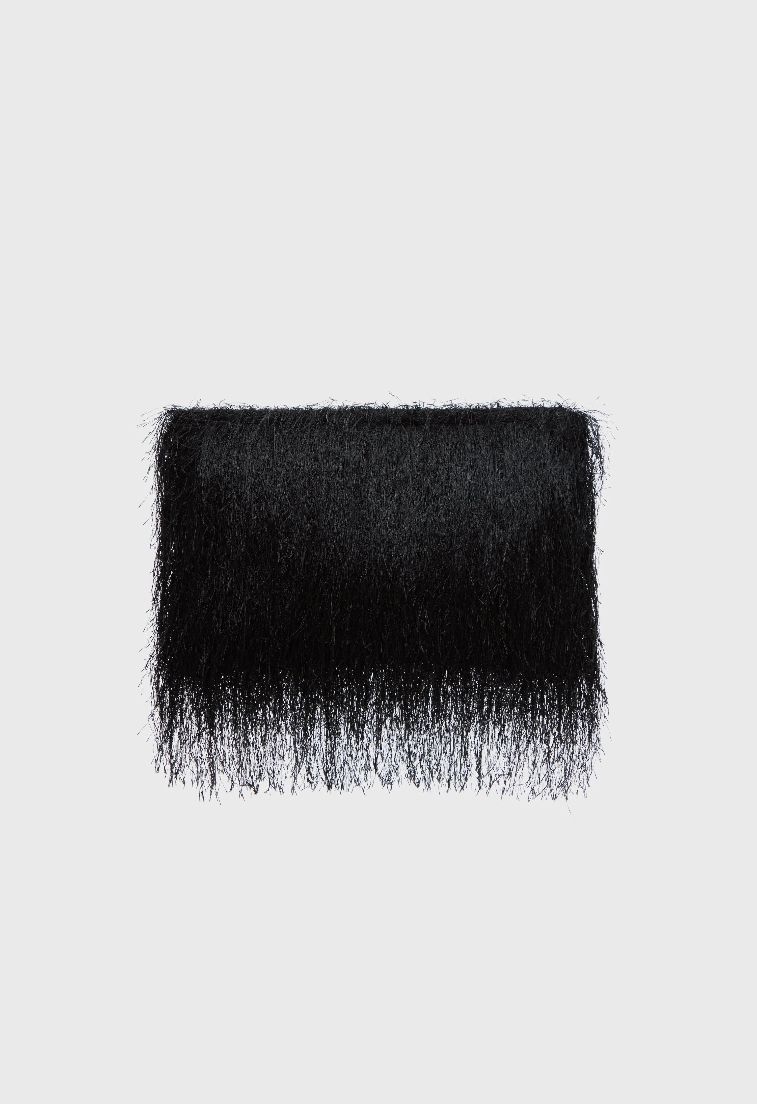 EVANO Fringed clutch sold by Loulou De Saison
