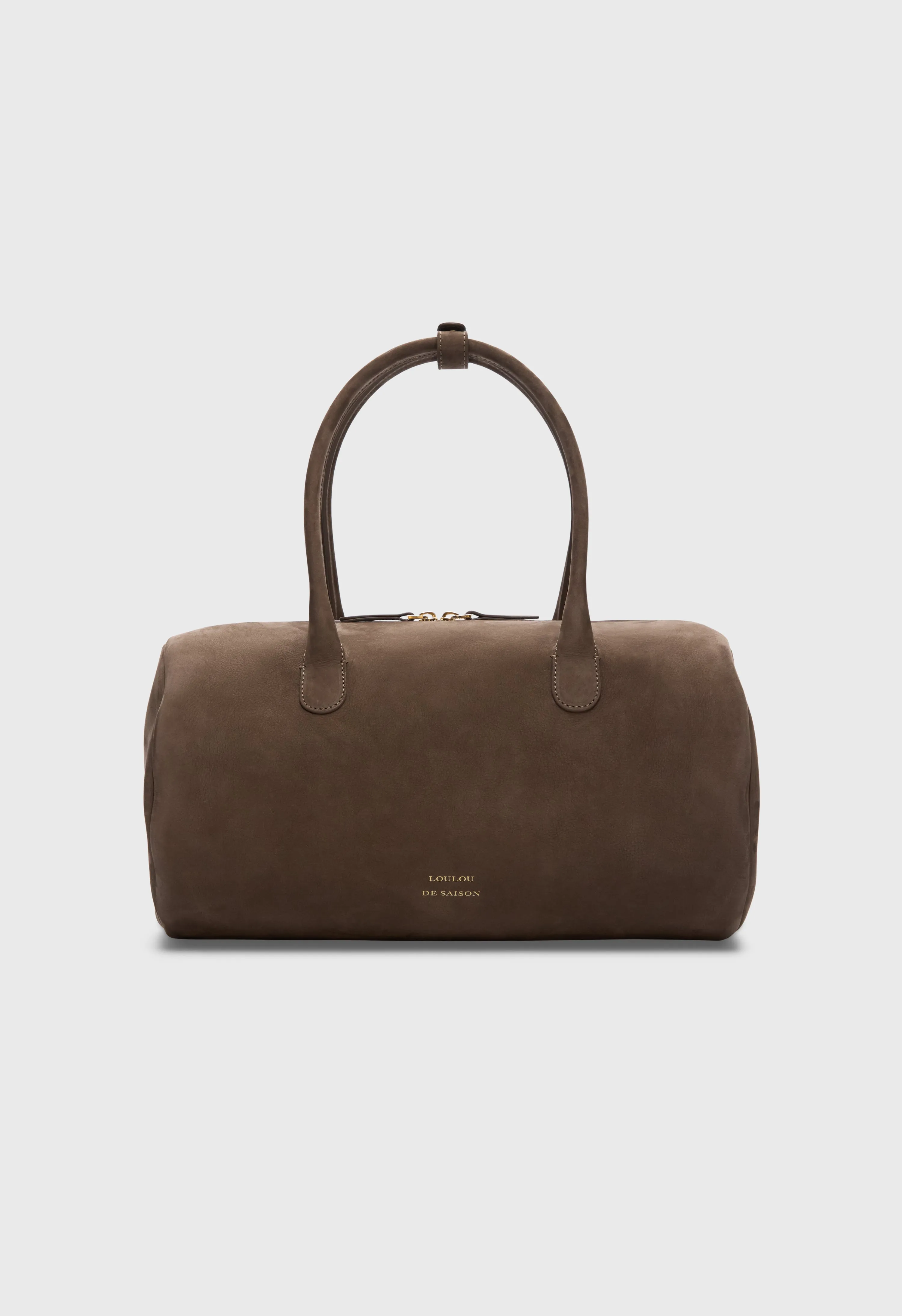 CLAUS Cylindric leather bag sold by Loulou De Saison