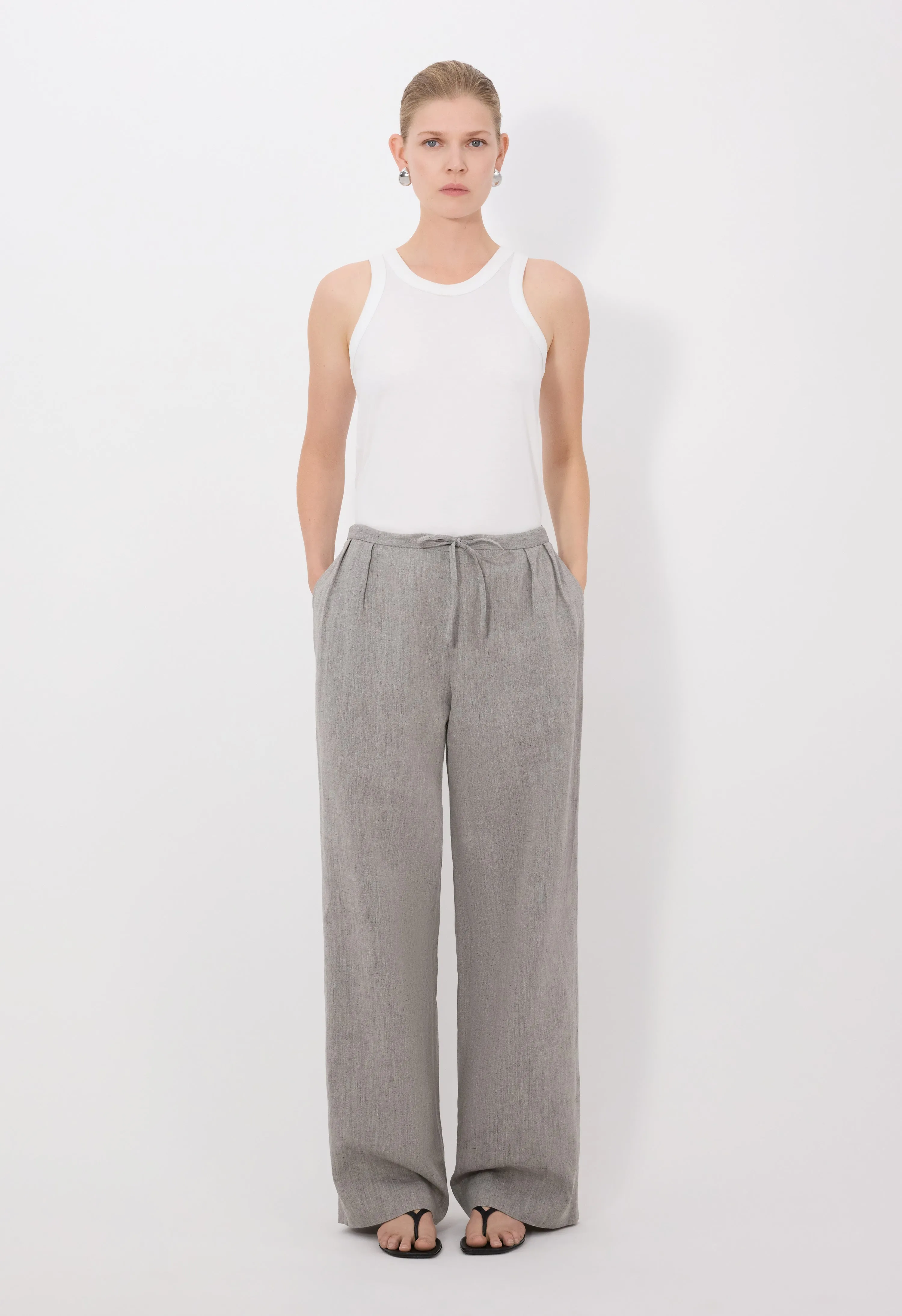 CLARK Pleated trousers sold by Loulou De Saison
