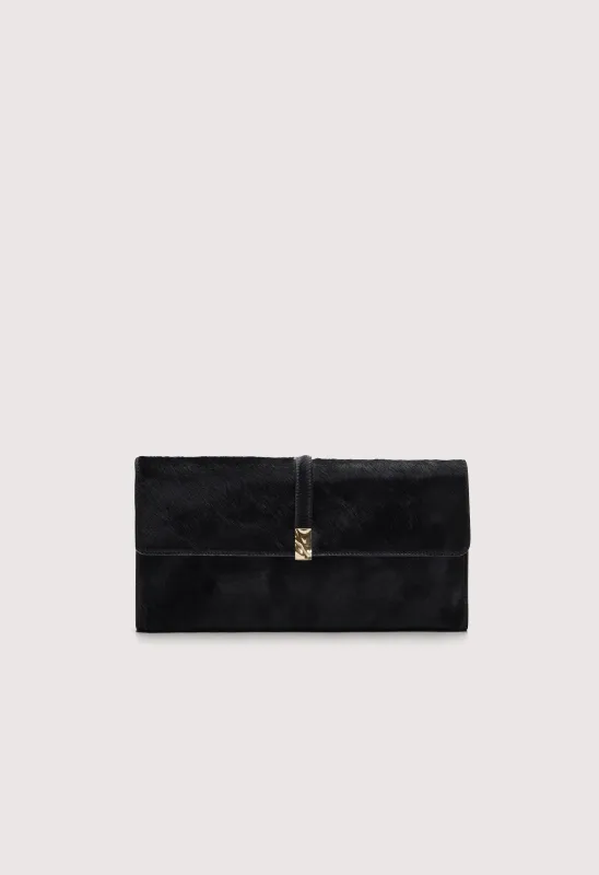 SIMONE Pony-effect leather clutch made by Loulou De Saison