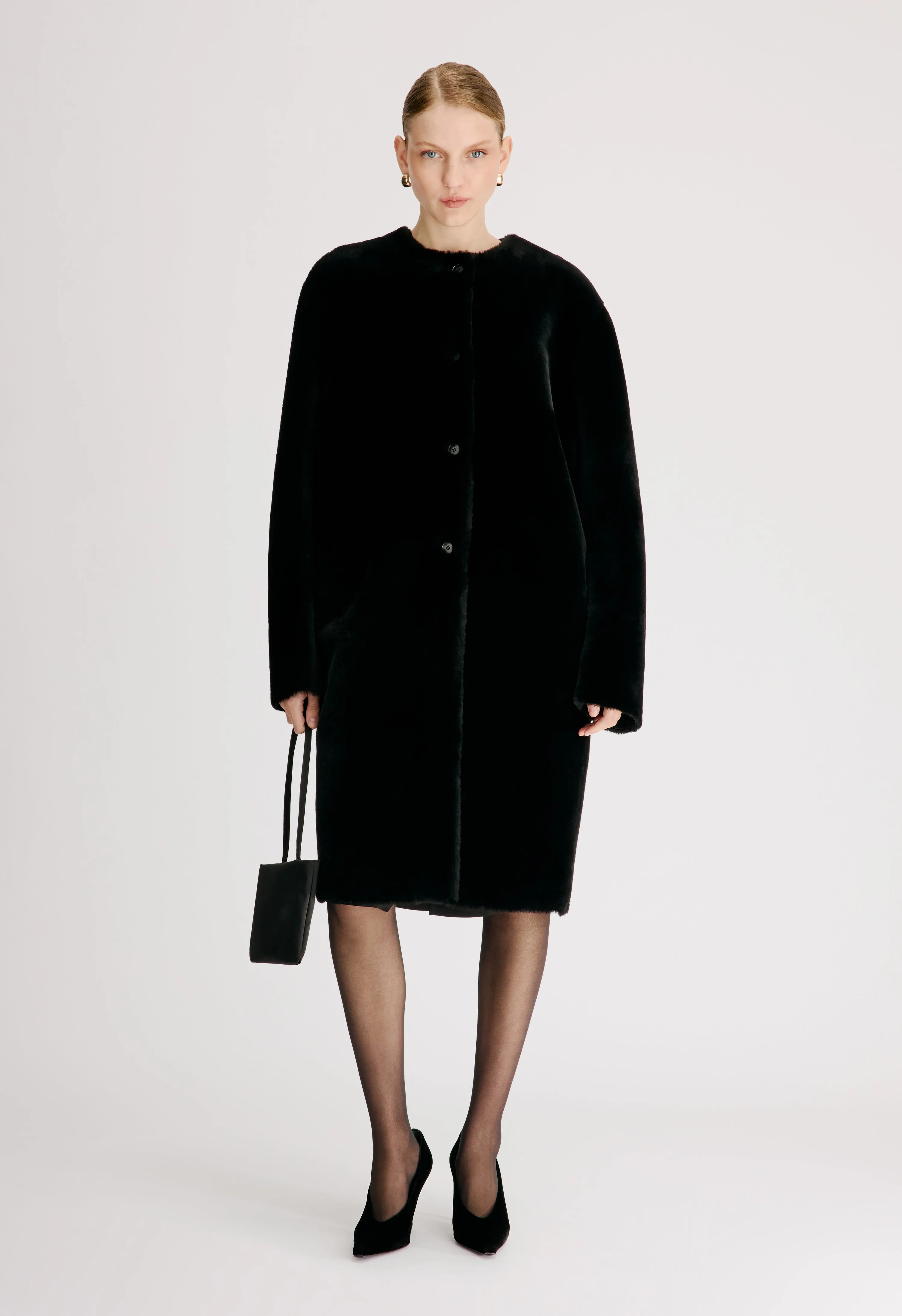 ELBA Reversible merino shearling coat sold by Loulou De Saison