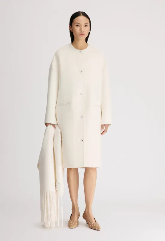 ORSON Oval-shaped midi coat made by Loulou De Saison