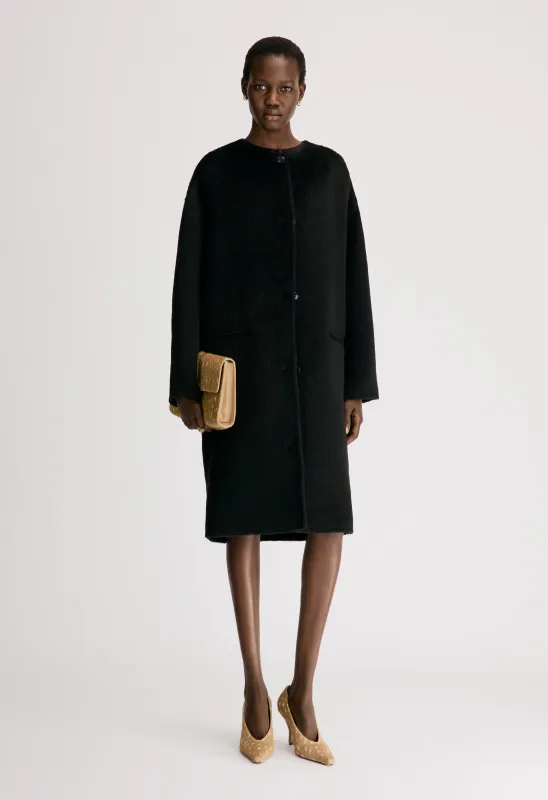ORSON Oval-shaped midi coat made by Loulou De Saison