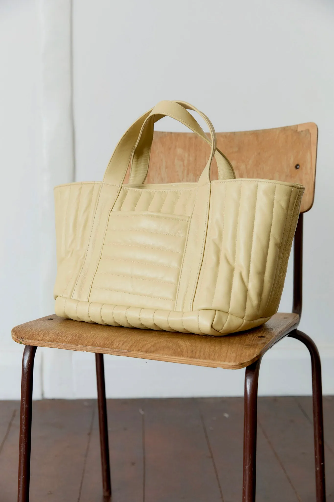 QUILTED LEATHER MINI TOTE BAG sold by Cawley