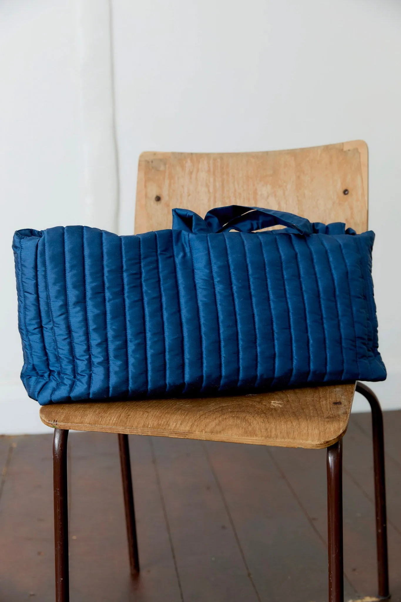 QUILTED SILK DUPION LARGE CLUTCH BAG sold by Cawley
