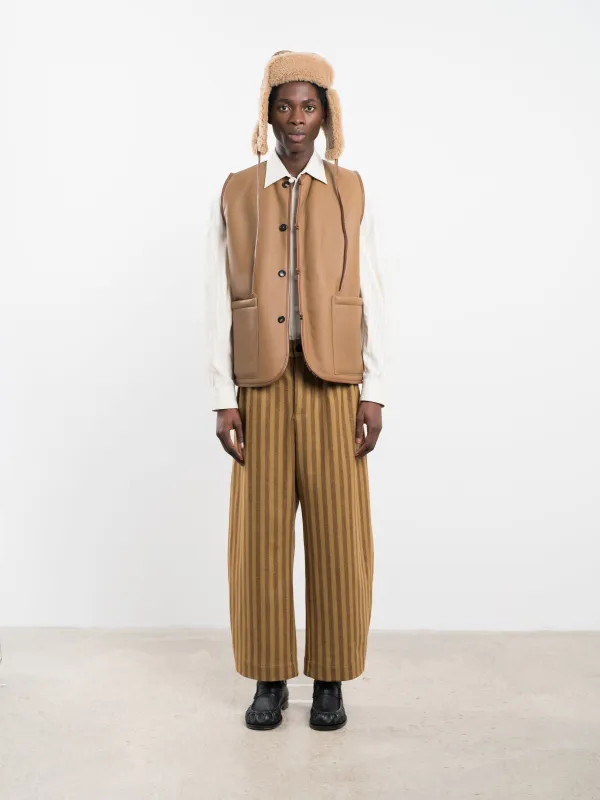 LEATHER BACK CURLY HAIR RIVER VEST sold by Cawley