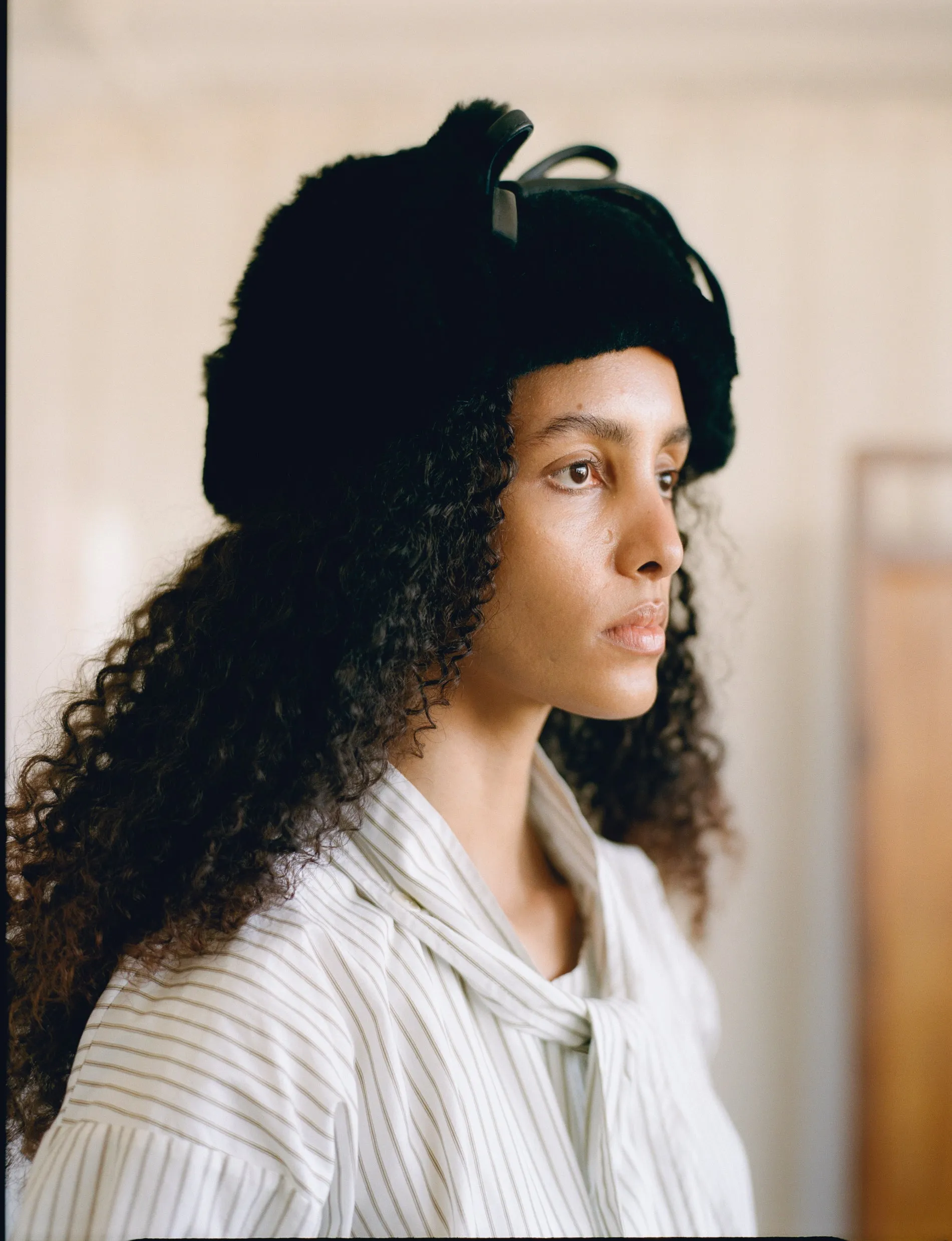 LEATHER BACK STRAIGHT HAIR TRAPPER HAT sold by Cawley