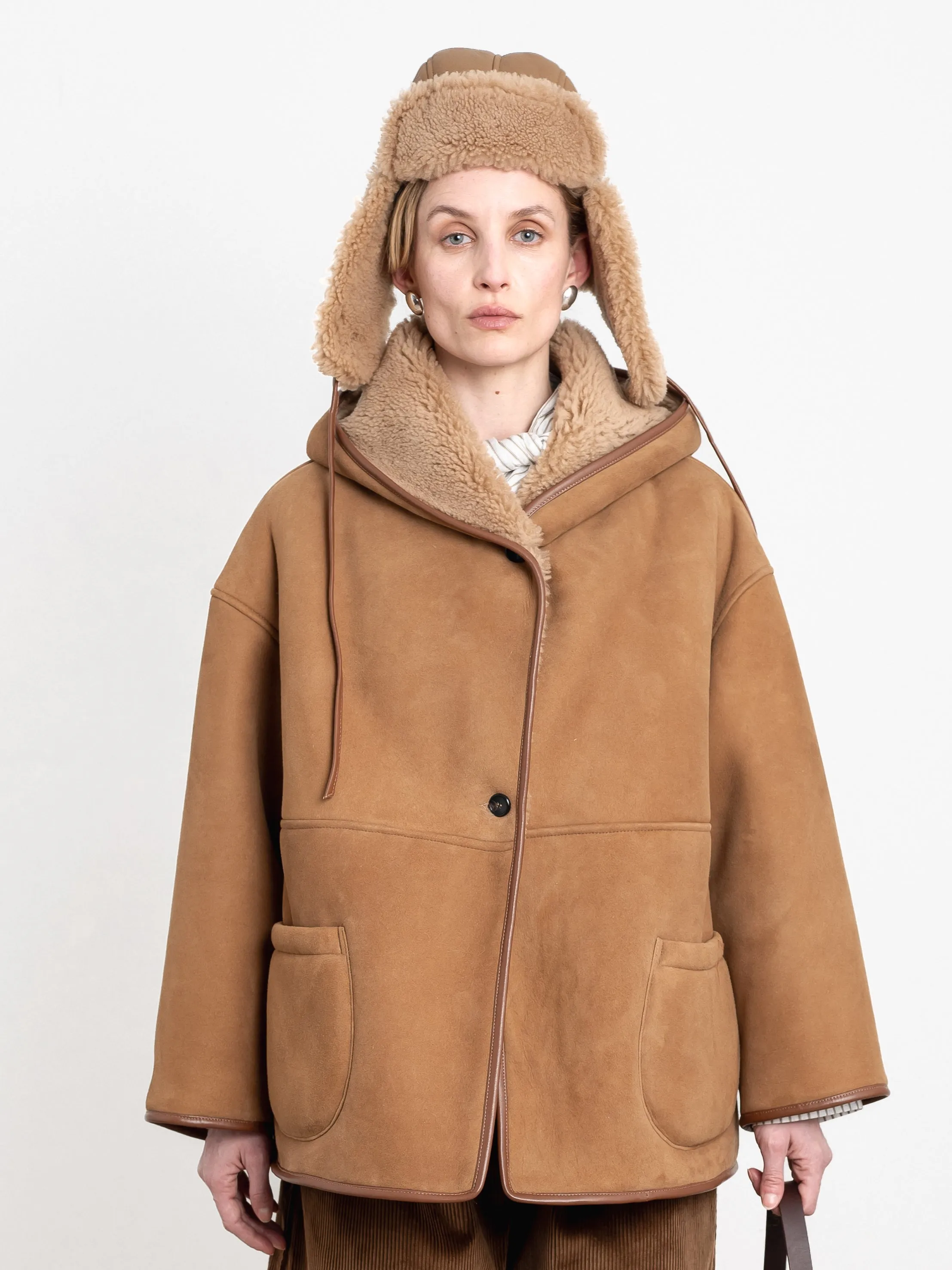 LEATHER BACK CURLY HAIR SHEEPSKIN TRAPPER HAT sold by Cawley