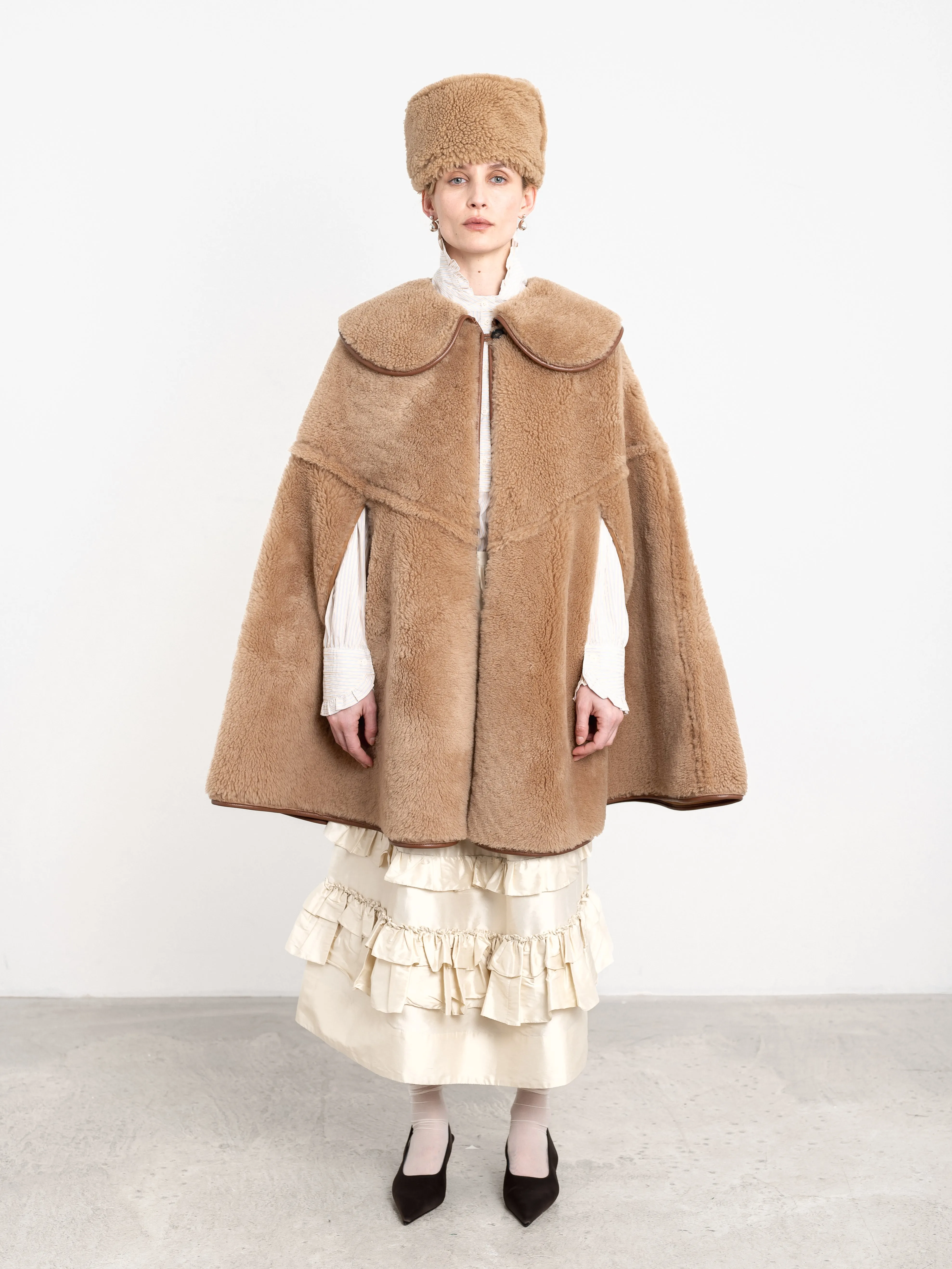 SUEDE BACK CURLY SHEEPSKIN ETTA CAPE sold by Cawley