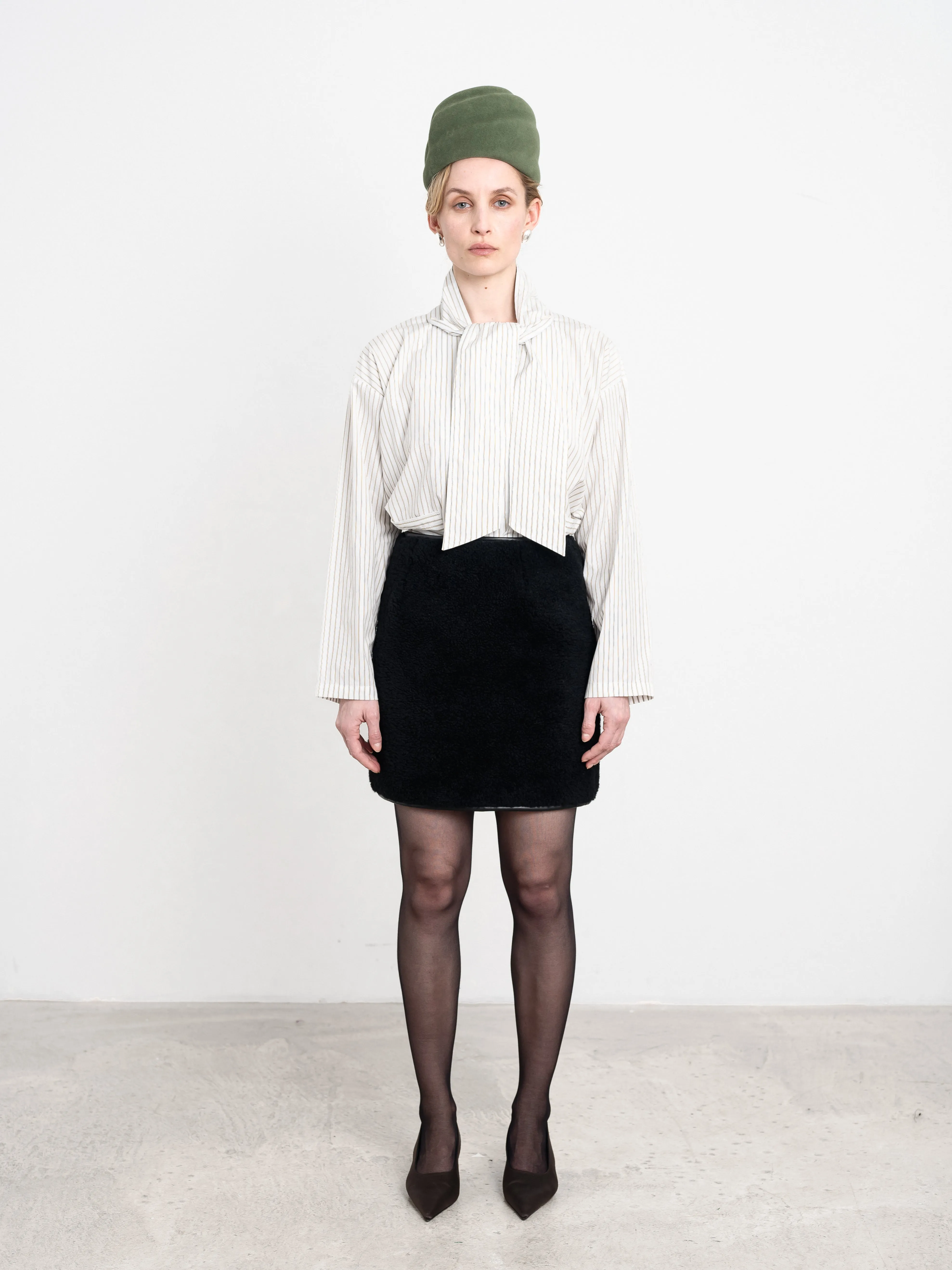 Leather Back Curly Hair Sheepskin Sadie Mini Skirt sold by Cawley