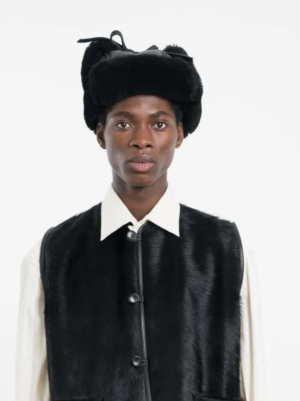 LEATHER BACK STRAIGHT HAIR TRAPPER HAT sold by Cawley