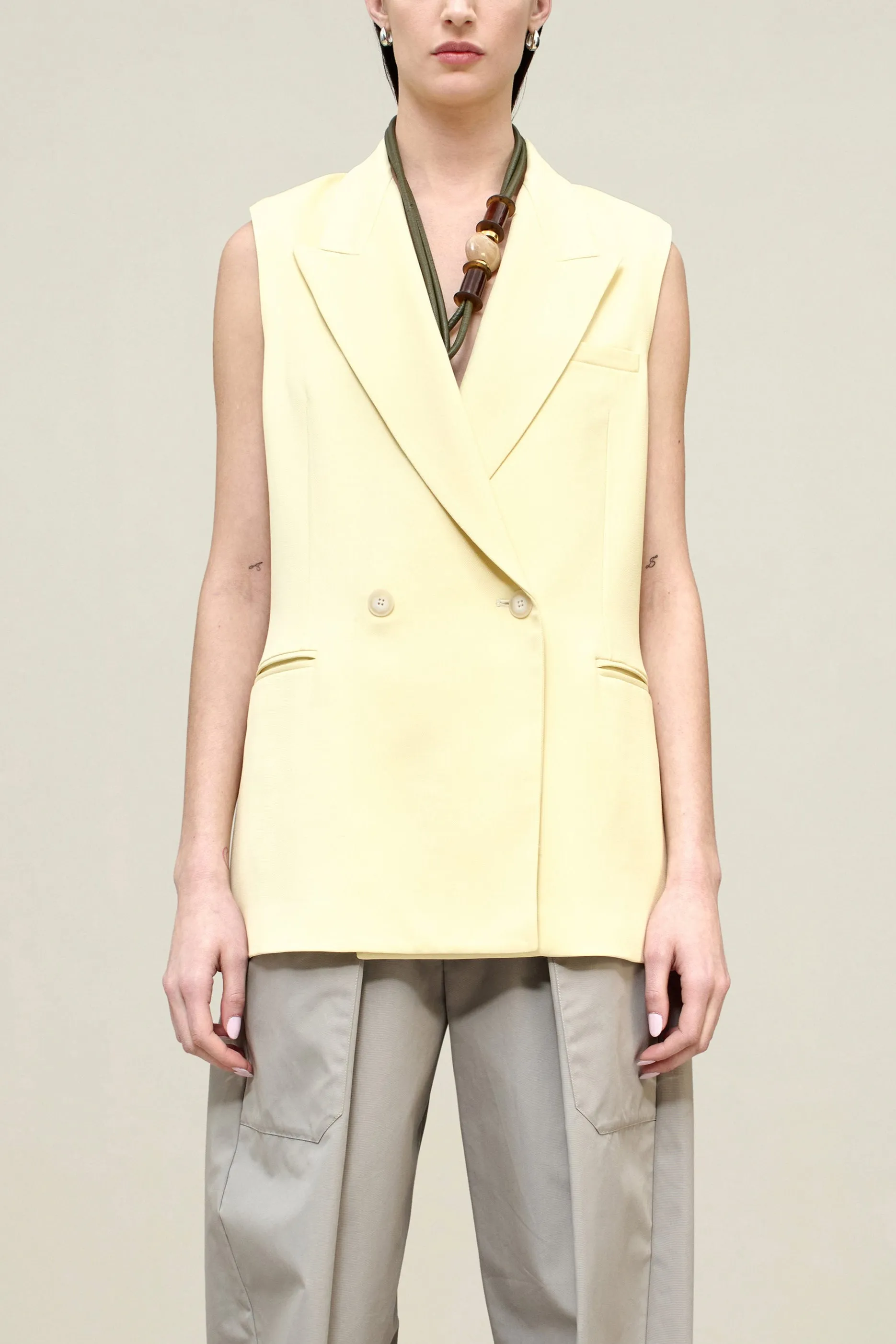 Deon Sleeveless Blazer in Grampian Twill sold by Kall Meyer