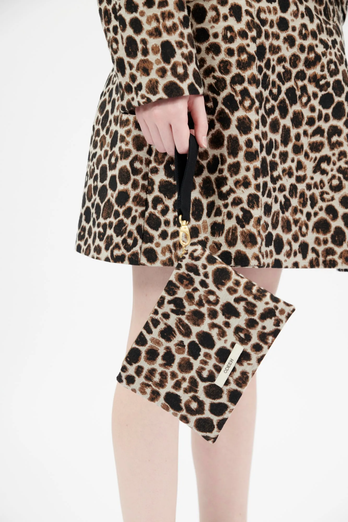 Snow Leopard Clutch, Myrrh sold by ODEEH
