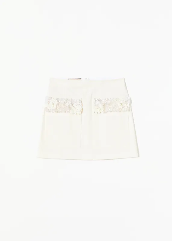 WHITE DRILL MINI SKIRT WITH SEQUINS made by Plan C
