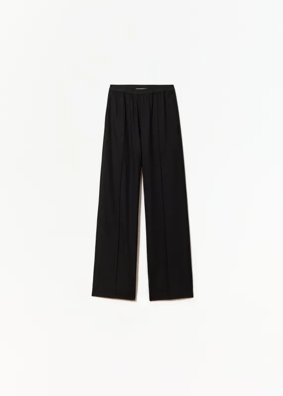 ELASTICATED WAIST BLACK TROUSERS sold by Plan C