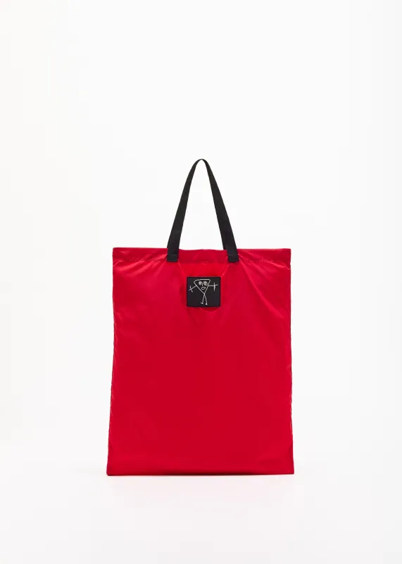 "PILI AND BIANCA" RED NYLON FOLDING SHOPPER made by Plan C