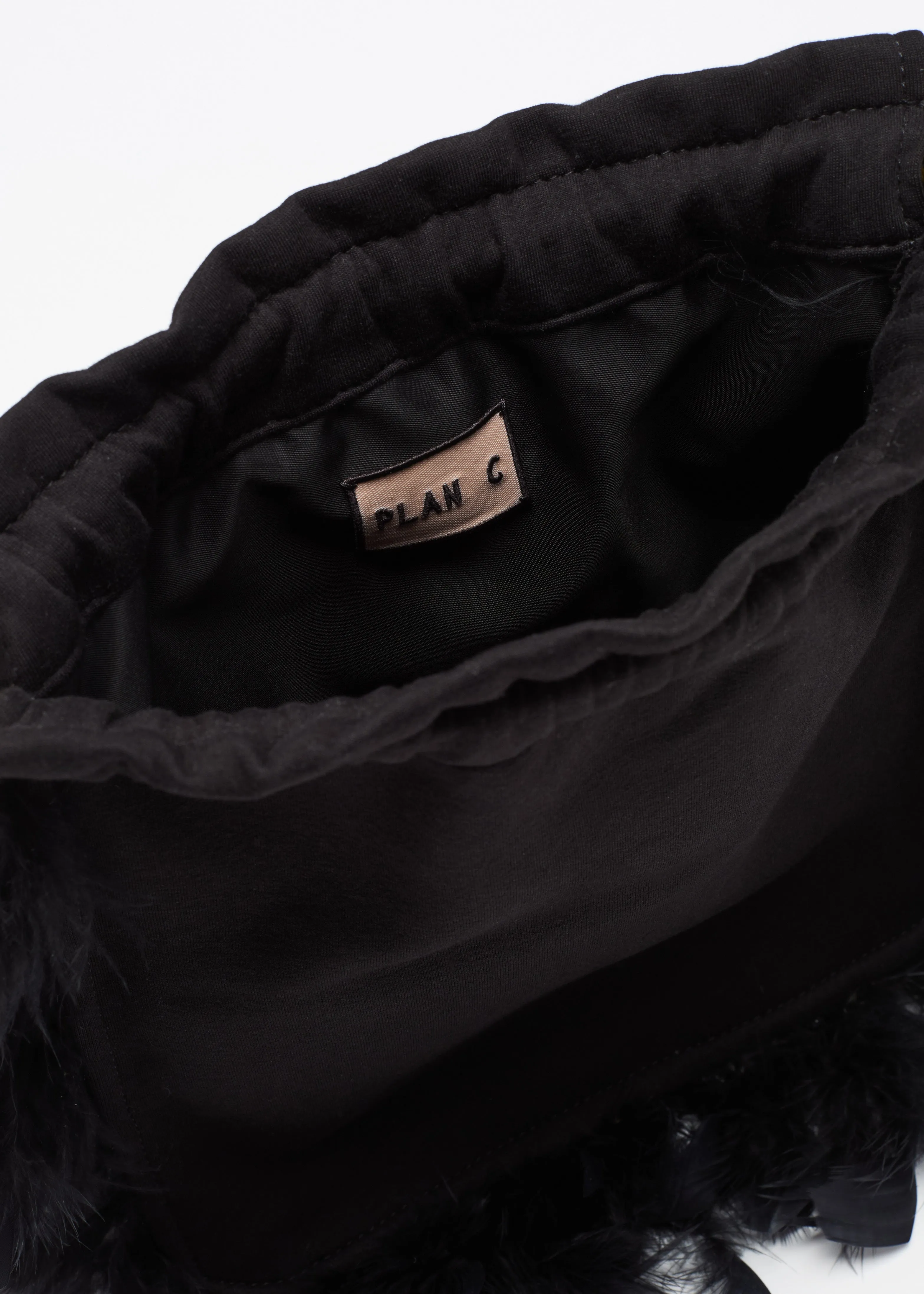 BLACK FLEECE POUCH WITH FEATHERS sold by Plan C product image thumbnail 4